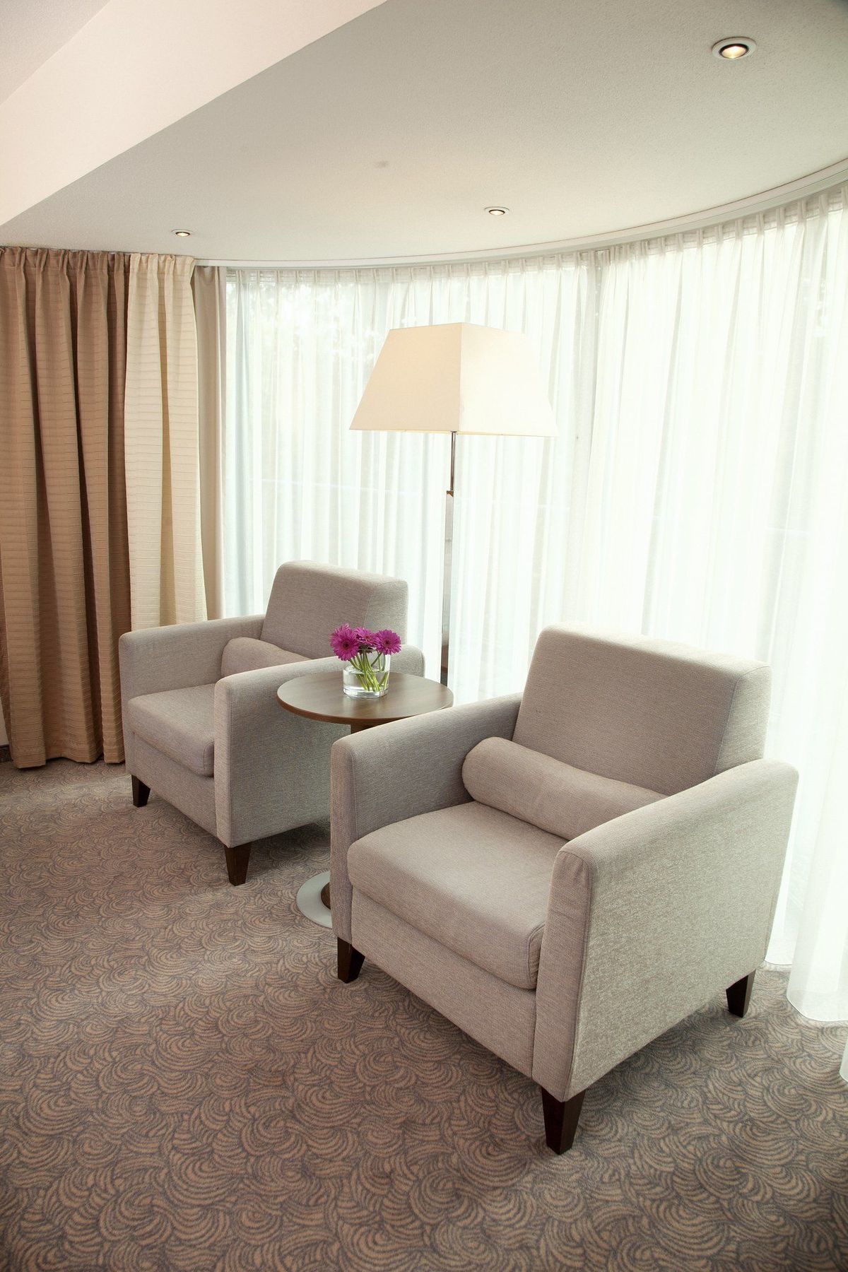 Bilderberg Garden Hotel Amsterdam Camera foto A seating area in a hotel room